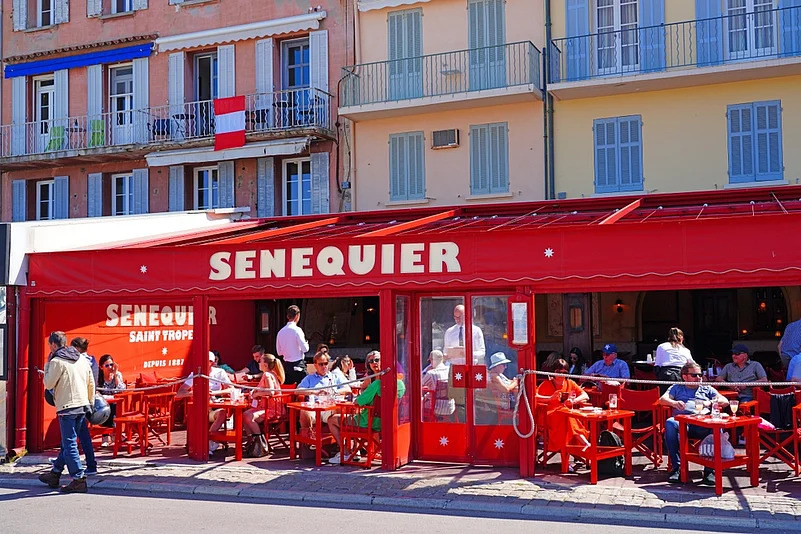 Senequier is a famous seaside bar and coffee shop in the harbour of St Tropez